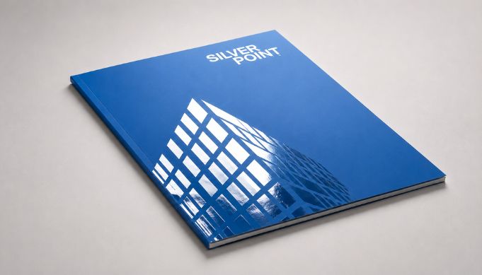 blue catalog with spot shiney uv coating